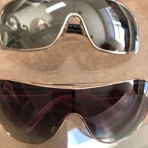 Gently used in original box two men sunglasses.